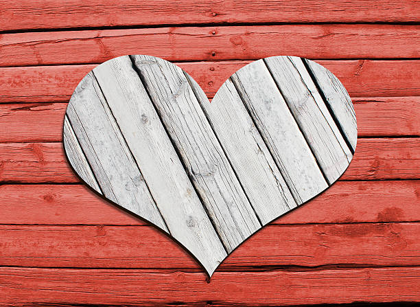 istock Heart carved on a wooden surface 474327597