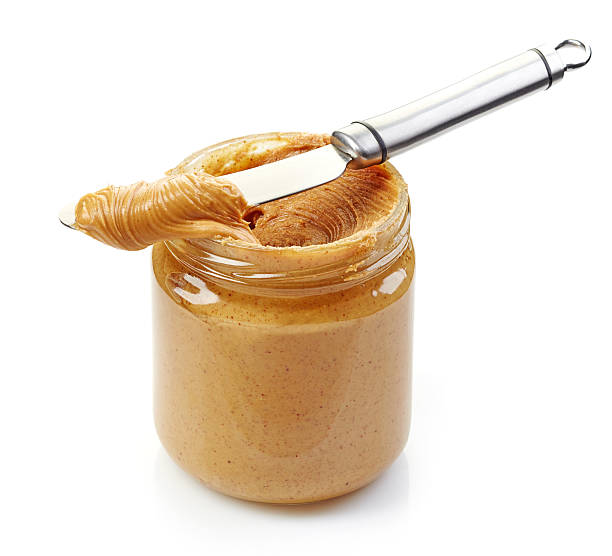 jar of peanut butter jar of peanut butter on a white background peanut butter stock pictures, royalty-free photos & images