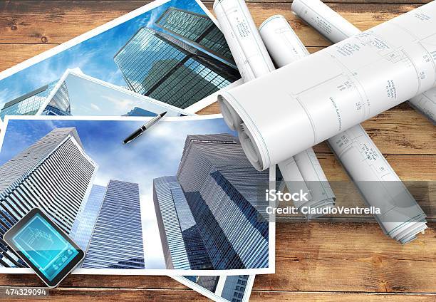 Blueprints And Pictures Of Skyscrapers Stock Photo - Download Image Now - 2015, Apartment, Architect