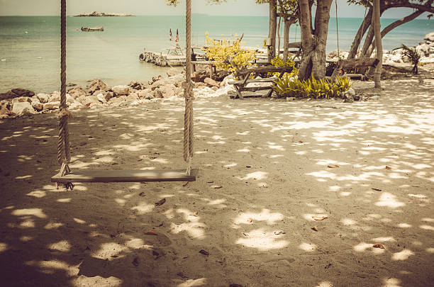 swing sur la plage vintage - Photo