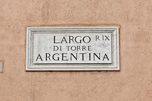 Largo di Torre Argentina  sign on a wall at Largo di Torre Argentina , Rome Italy