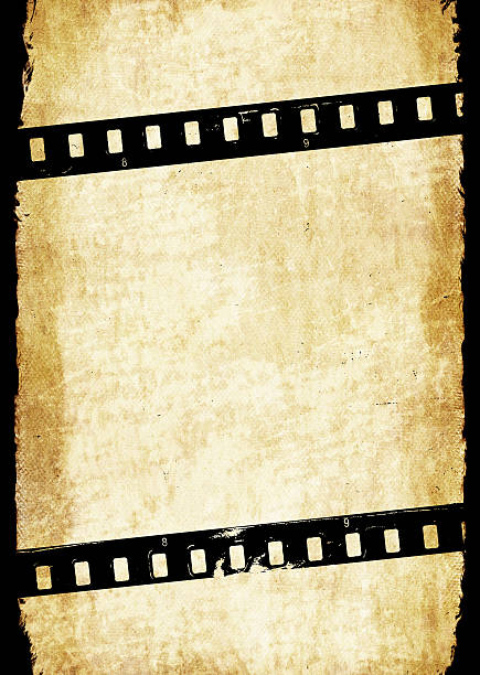 istock Aged paper background with film strip 474331390