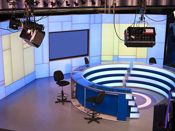 istock TV NEWS studio with light equipment ready for recording 474335044