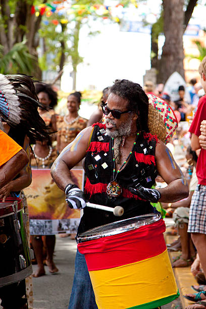 St. John, US Virgin Islands - July 4, 2013: local steel panist playing on his steel pan at a month-long St. John Festival and Carnival, the theme for 2013's Festival was \