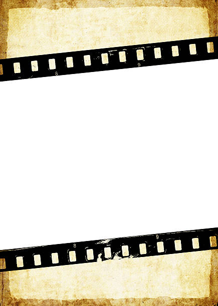 istock Aged paper background with film strip 474335200