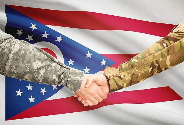 istock Military handshake and US state flag - Ohio 474341236