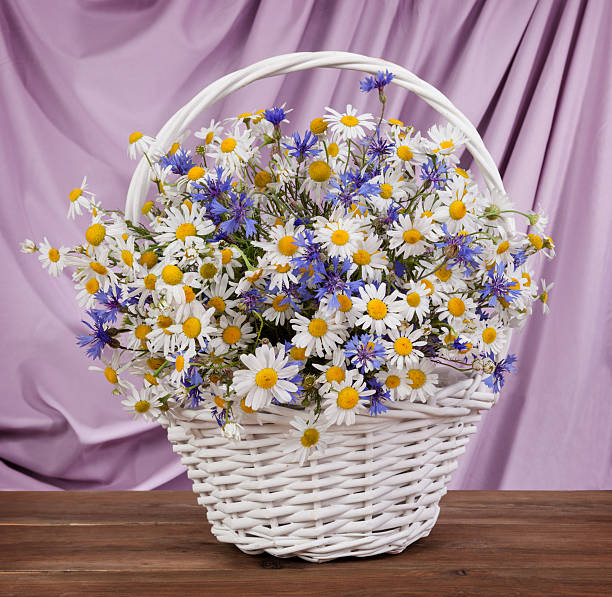 istock Bouquet of chamomiles on the table. 474341894