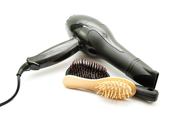 istock Black Hairdryer with Different Hairbrush 474343733