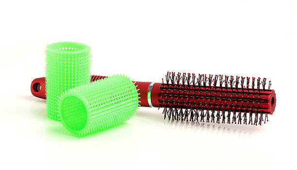 istock Round hair brush and curler. 474343779