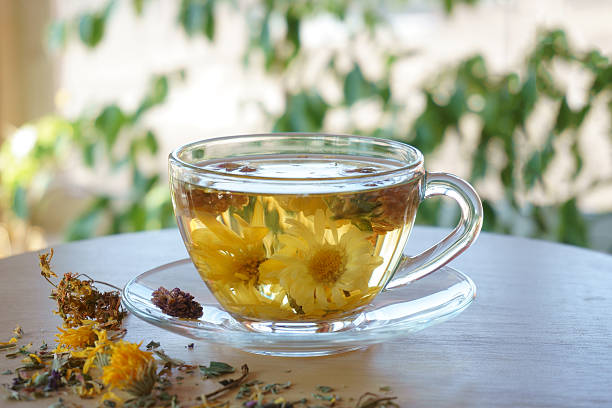 istock cup of flower tea 474344192