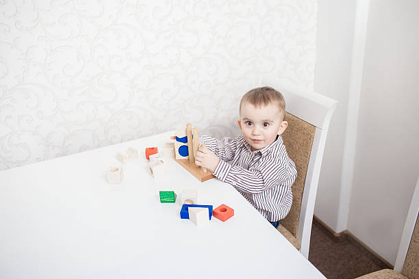 istock Cute baby boy with blocks 474344774