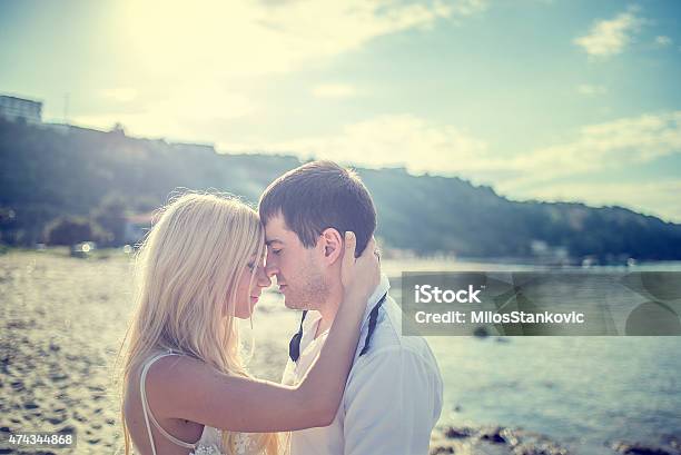 Just Merried Romance At The Beach Stock Photo - Download Image Now - Couple - Relationship, Kissing, 2015