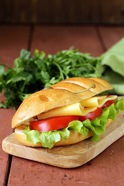 istock Fresh sandwich with vegetables, green salad and cheese 474345631