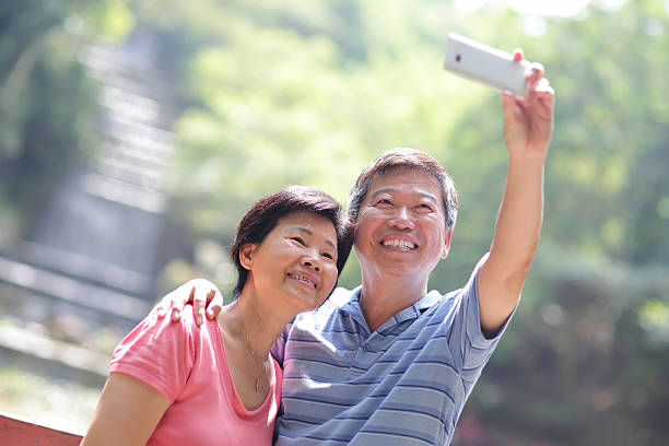istock Senior happy couple taking a selfie 474347936