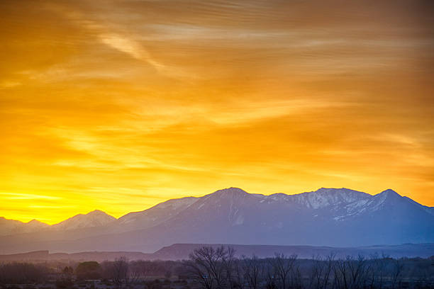 istock sunrise over colorado rocky mountains 474349326