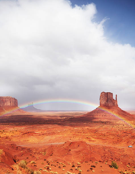 istock magnificent rainbow over the famous red sandstone Mittens 474351073