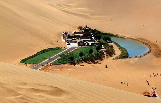 istock China Dunhuang Mingsha mountain, Desert oasis 474351289