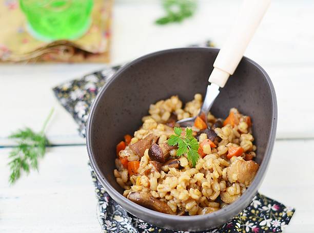 istock Barley groats with mushroom 474352823