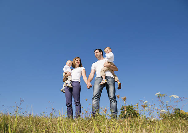 istock Happy family in nature 474353931