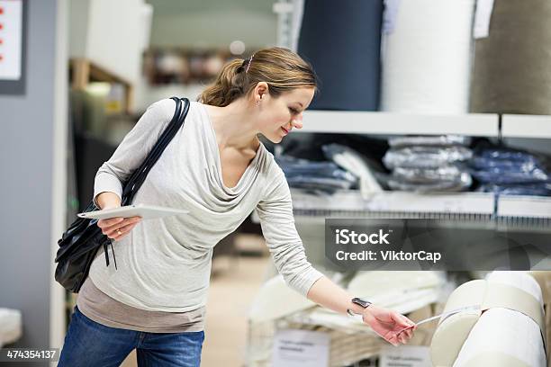 Young Woman Shopping For Furniture Stock Photo - Download Image Now - Adult, Cabinet, Communication