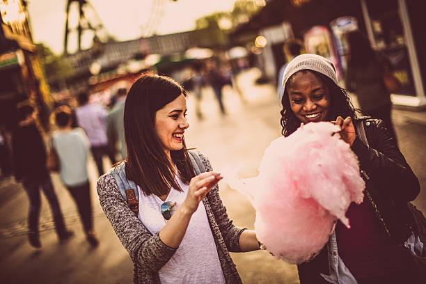 istock Friends in the amusement park 474355056
