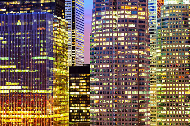 istock Gleaming Office Building Towers Illuminated at Twilight 474356324