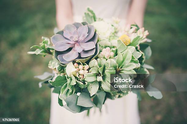 Bride Holding The Wedding Bouquet With Succulent Flowers Closeup Stock Photo - Download Image Now