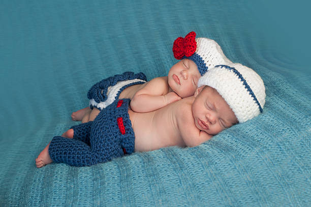 Newborn Twin Babies in Sailor Costumes stock photo