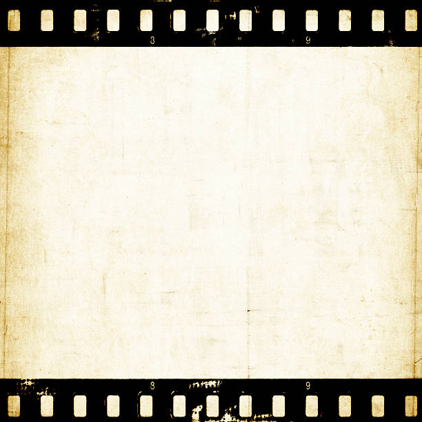 istock Aged paper background with film strip 474363528