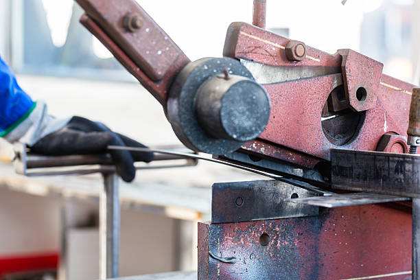 istock Craftsman cutting Metal with shear 474366529