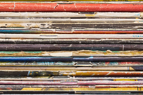 istock Closeup view of old magazines pile end 474366992