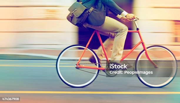 Speeding Through The Streets Stock Photo - Download Image Now - Cycling, Occupation, Bicycle