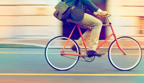 Cropped shot of a man riding his bicycle through the cityhttp://195.154.178.81/DATA/i_collage/pi/shoots/782748.jpg