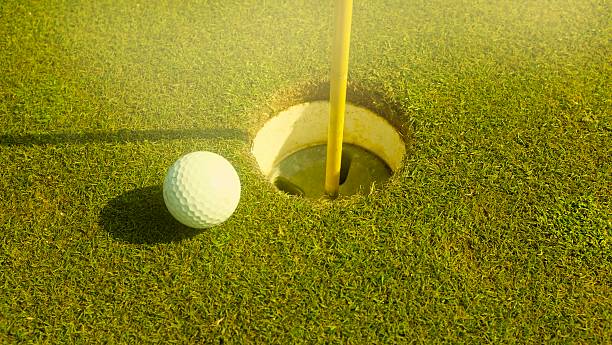 istock golf ball close to the hole shot unfortunate 474369468