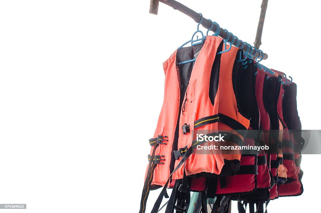 Hanged life jacket isolated Hanged life jacket isolated on white background 2015 Stock Photo