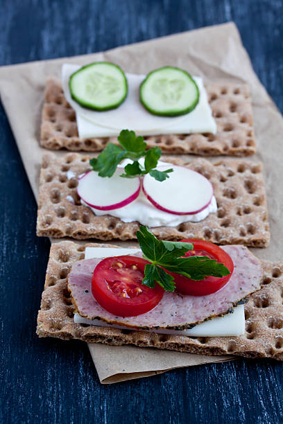 istock crisp bread with cheese and smoked turkey meat 474370622