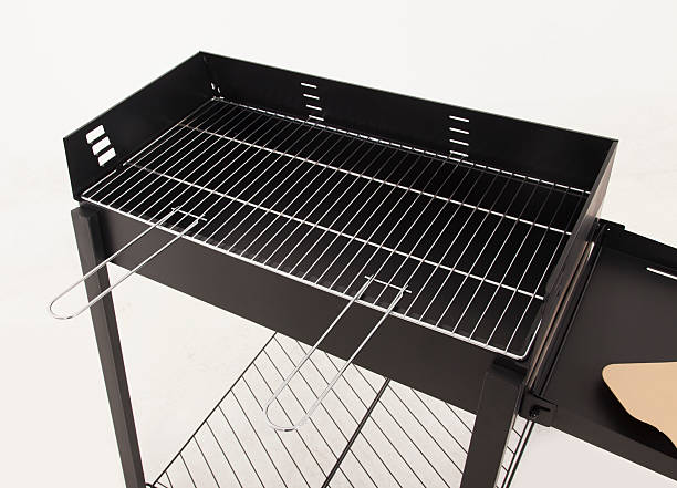 istock New and empty barbecue grill on white 474371590