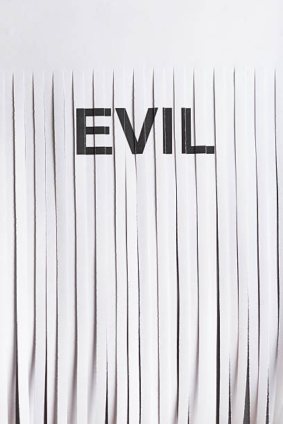 Shredded Evil on Paper Concept stock photo