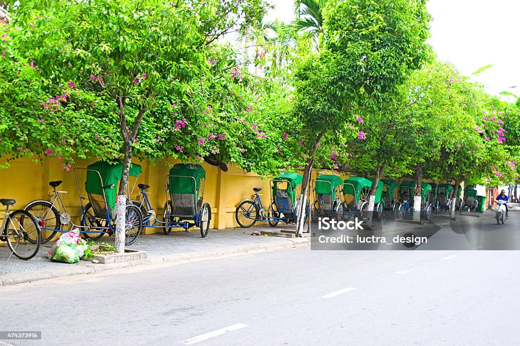 Typical old house with yellow wall, paper flower 2015 Stock Photo