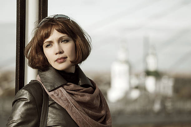istock Sad beautiful woman daydreaming 474374007