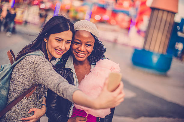 istock Taking selfie in the amusement park 474374064