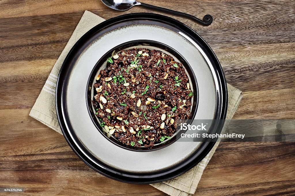 Quinoa Pilaf Quinoa Pilaf with parsley, pine nuts and cranberries. Directly Above Stock Photo