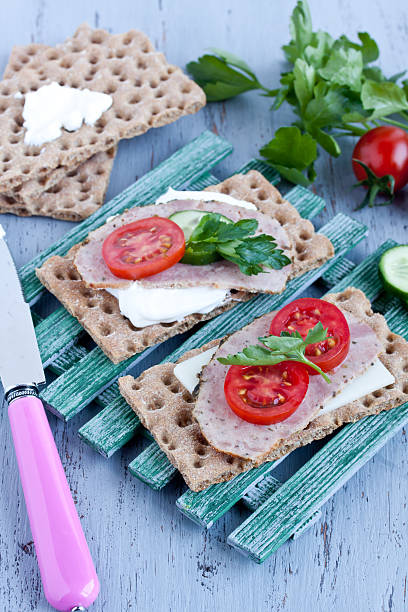 istock crisp bread with cheese and smoked turkey meat 474374280