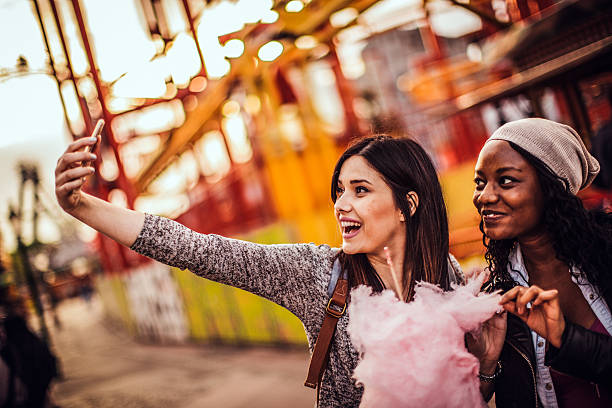 istock Taking selfie in the amusement park 474374334