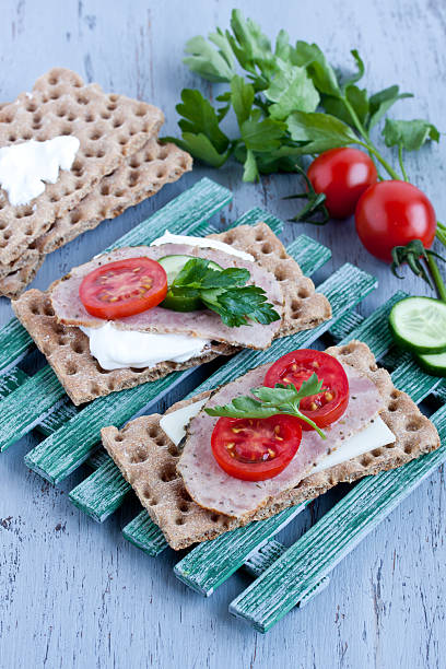 istock crisp bread with cheese and smoked turkey meat 474377244