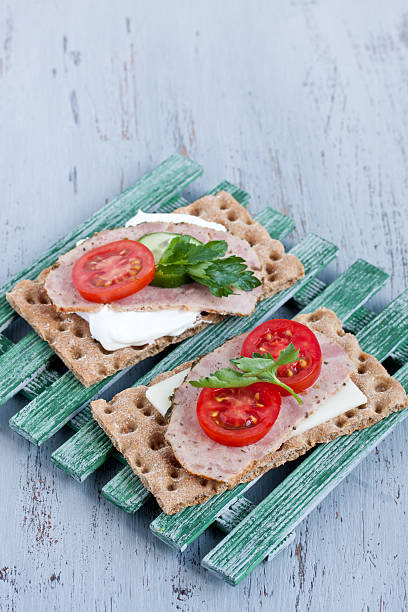istock crisp bread with cheese and smoked turkey meat 474377422