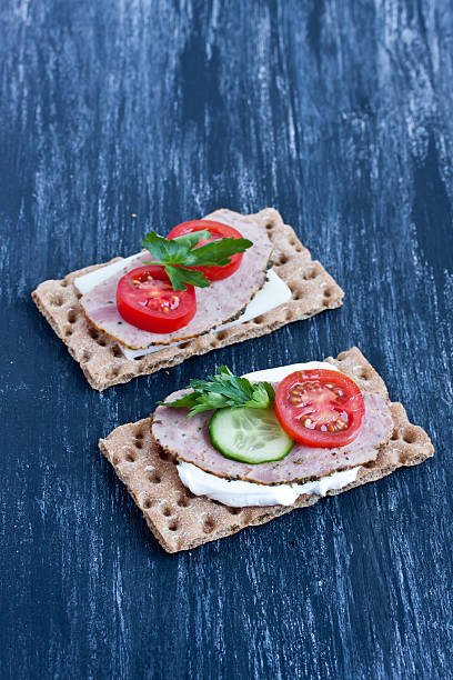 istock crisp bread with cheese and smoked turkey meat 474377482