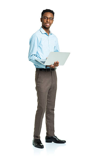 istock Happy african american college student standing with laptop on white 474378036