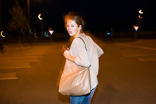 istock Scared young woman running from her pursuer 474378163