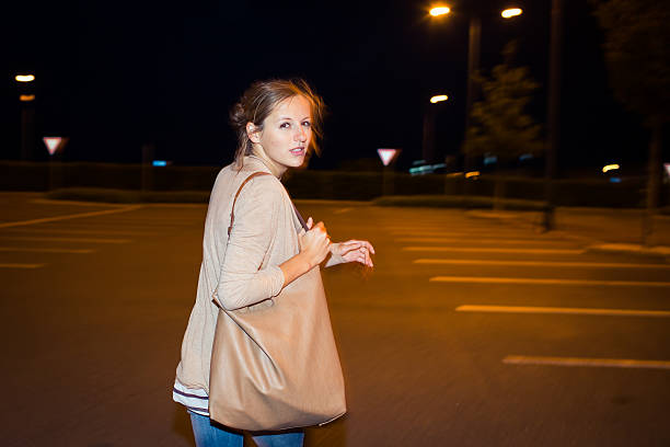 istock Scared young woman running from her pursuer 474378207
